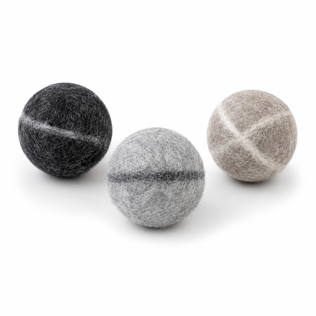 The Mayberry Wool Fetch Ball - set of three felted wool balls in charcoal, grey, and oatmeal